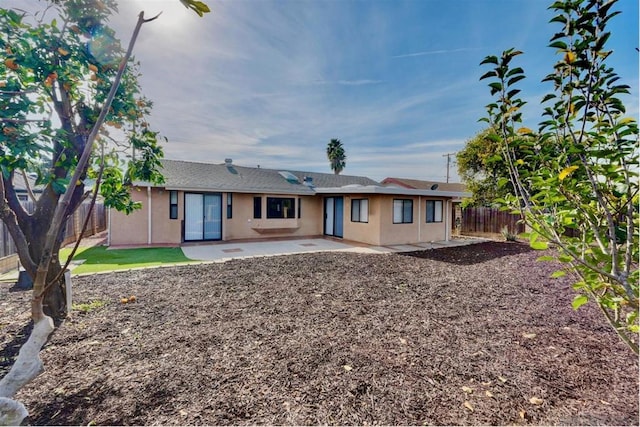 view of front of home featuring a patio