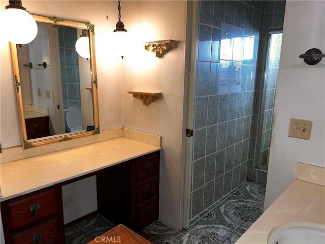 full bathroom featuring vanity and a shower stall