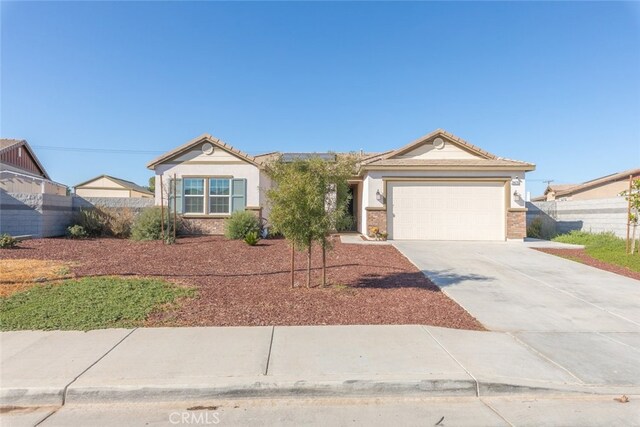 single story home featuring a garage