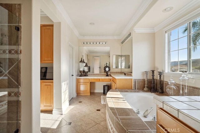 bathroom featuring tile patterned floors, vanity, crown molding, and separate shower and tub