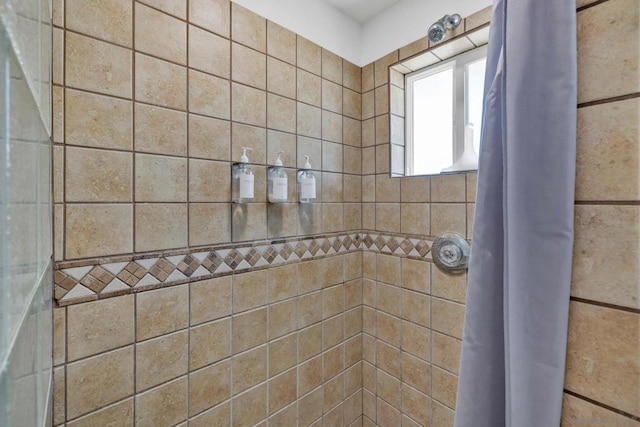 bathroom with curtained shower