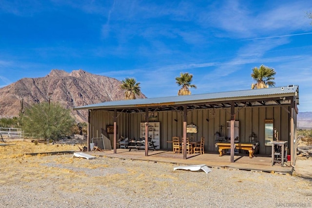 view of outdoor structure featuring a mountain view