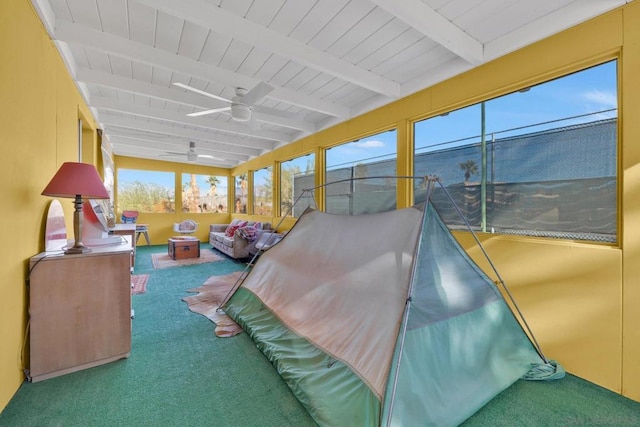 bedroom featuring wooden ceiling, beamed ceiling, and carpet flooring