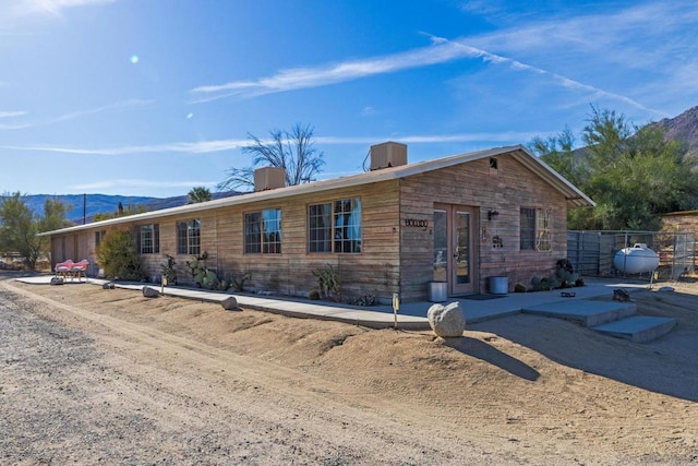 single story home with a mountain view