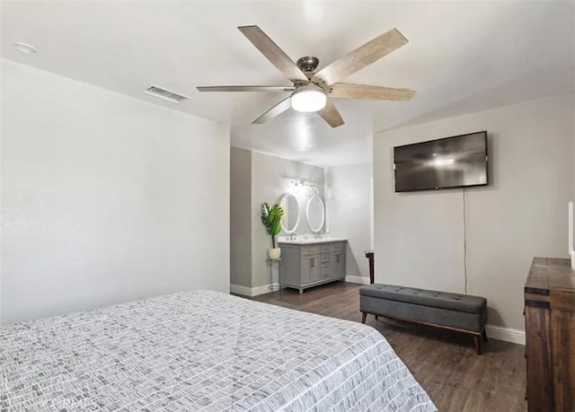 bedroom featuring ceiling fan and dark hardwood / wood-style flooring