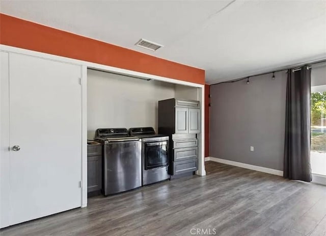 kitchen with dark wood-type flooring