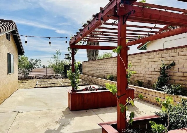 view of patio / terrace featuring a pergola