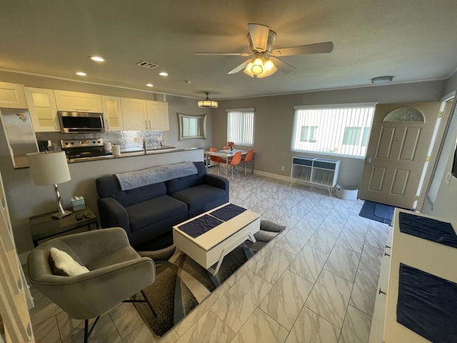 living room with ceiling fan