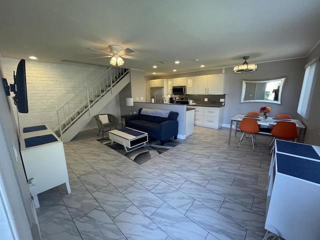 living room featuring ceiling fan