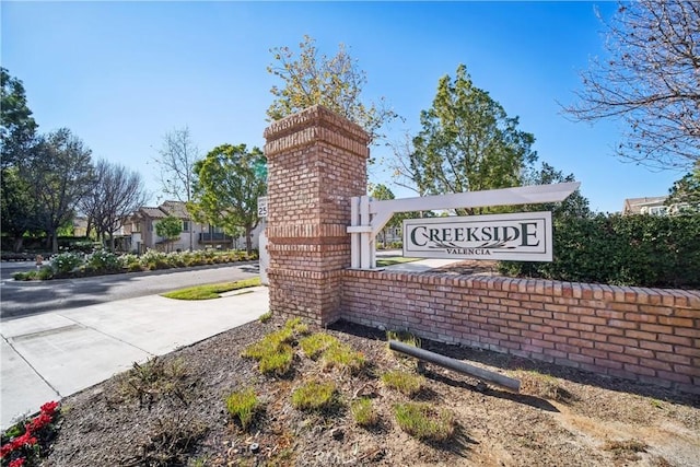 view of community sign