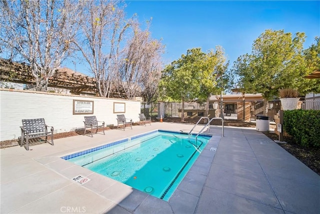 view of swimming pool featuring a patio