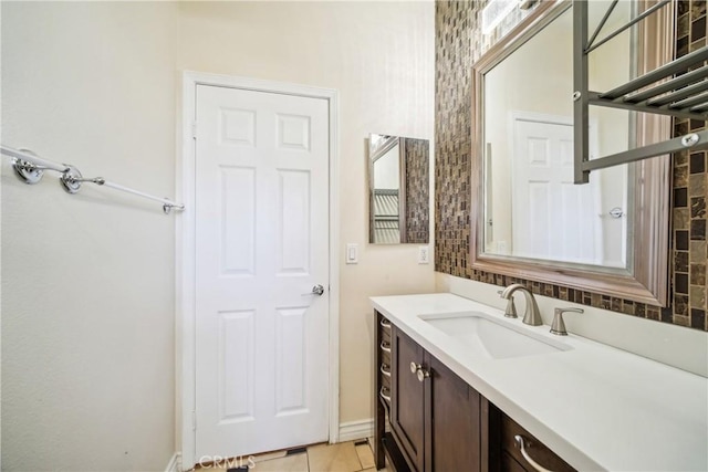 bathroom featuring tile patterned floors and vanity