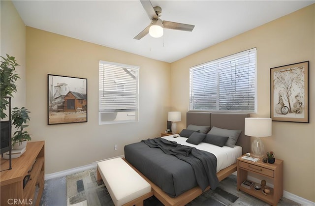 carpeted bedroom with ceiling fan