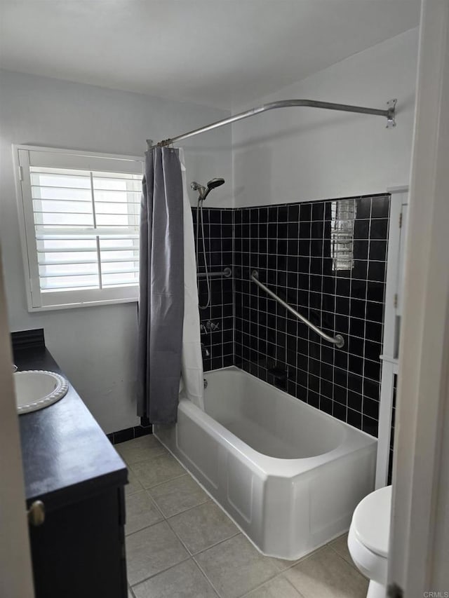 full bathroom with toilet, tile patterned floors, vanity, and shower / bath combo