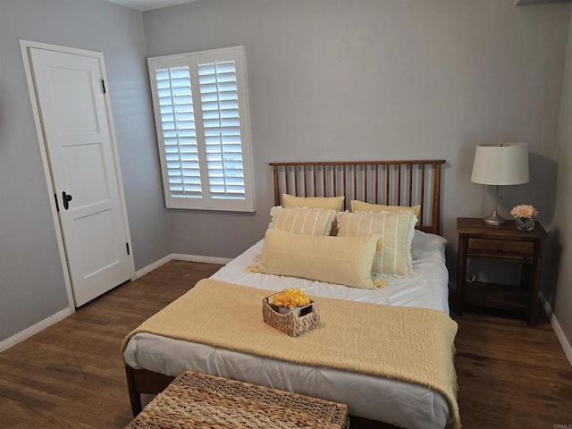 2416 J Ave, National City, CA 91950 - bedroom featuring dark wood finished floors and baseboards