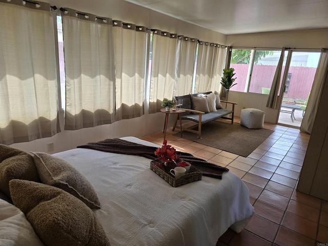 2416 J Ave, National City, CA 91950 - bedroom featuring tile patterned floors and access to exterior