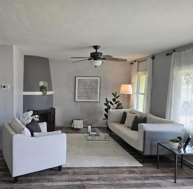 2416 J Ave, National City, CA 91950 - living area featuring wood finished floors, plenty of natural light, and a ceiling fan