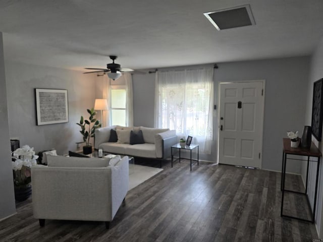 2416 J Ave, National City, CA 91950 - living area with dark wood-style flooring and ceiling fan