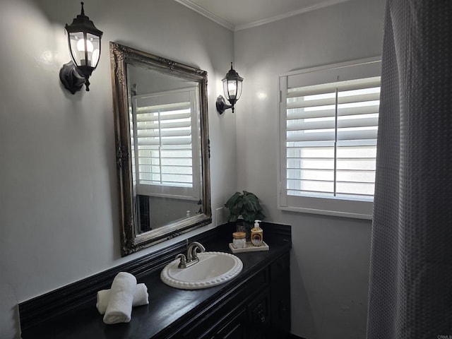 2416 J Ave, National City, CA 91950 - bathroom with healthy amount of natural light, crown molding, and vanity