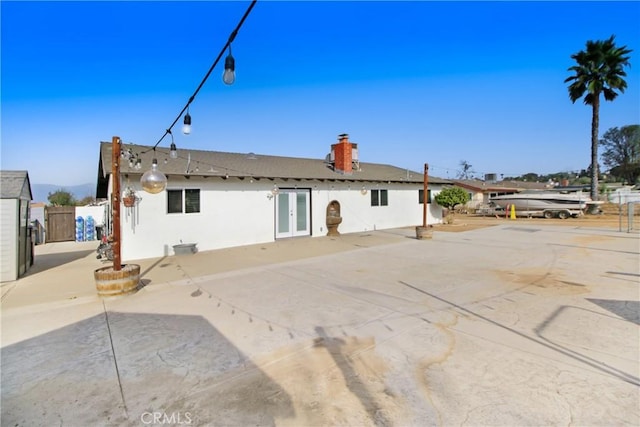 rear view of property with a patio