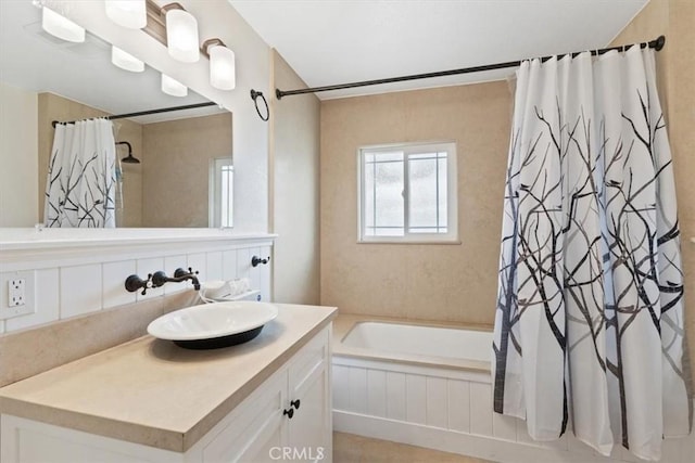 bathroom with shower / bathtub combination with curtain and vanity