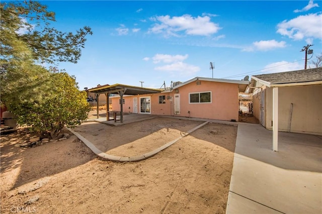 back of house featuring a patio area