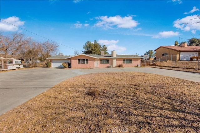 single story home featuring a garage