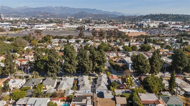 birds eye view of property featuring a mountain view