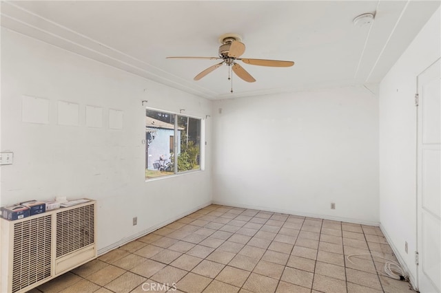 empty room featuring ceiling fan