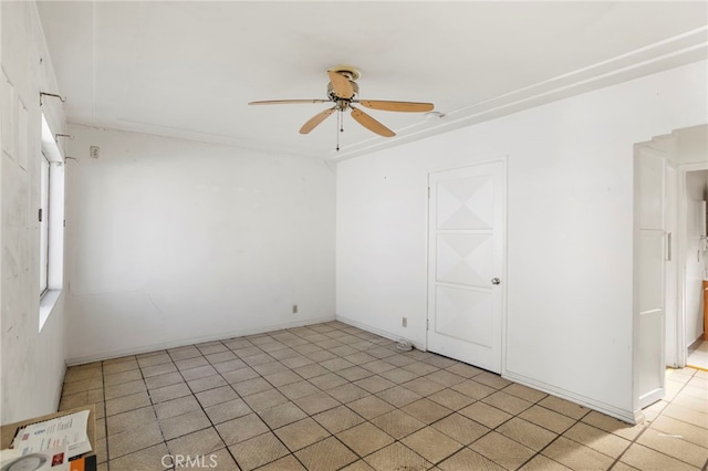 spare room featuring ceiling fan