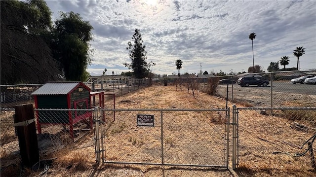 view of yard with a rural view