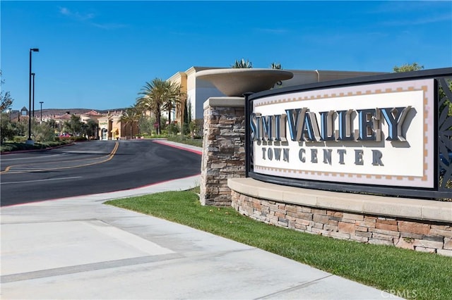 view of community sign