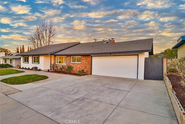 ranch-style home with a garage