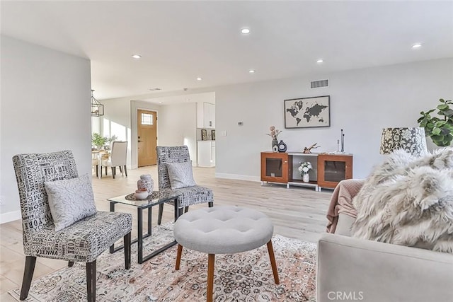 living room featuring light wood-type flooring