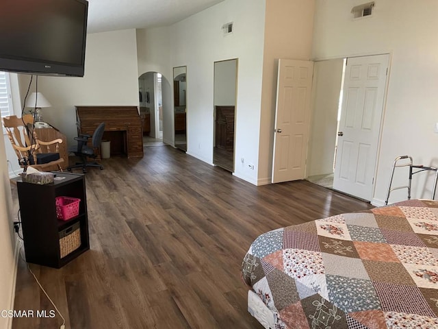 bedroom featuring dark wood-type flooring