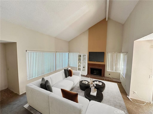 carpeted living room with high vaulted ceiling, a brick fireplace, beamed ceiling, and a textured ceiling