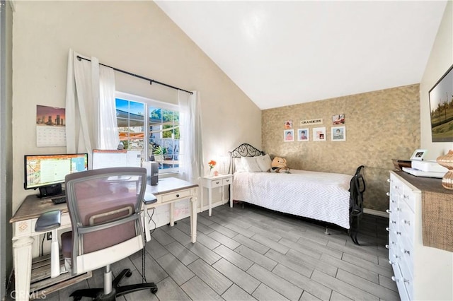 bedroom with lofted ceiling