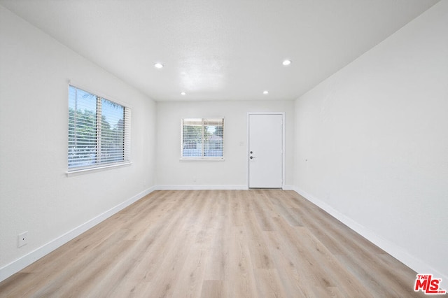 empty room featuring light hardwood / wood-style floors