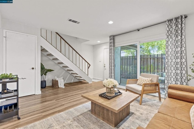 living room with hardwood / wood-style floors