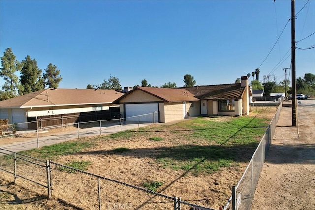 single story home with a garage