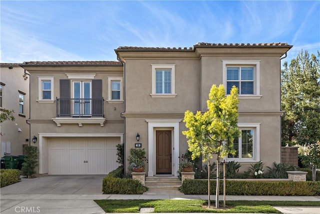 mediterranean / spanish-style home featuring a garage