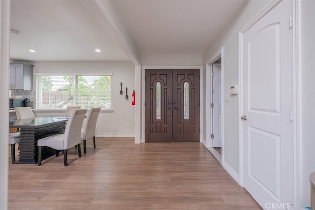 foyer featuring light wood-type flooring