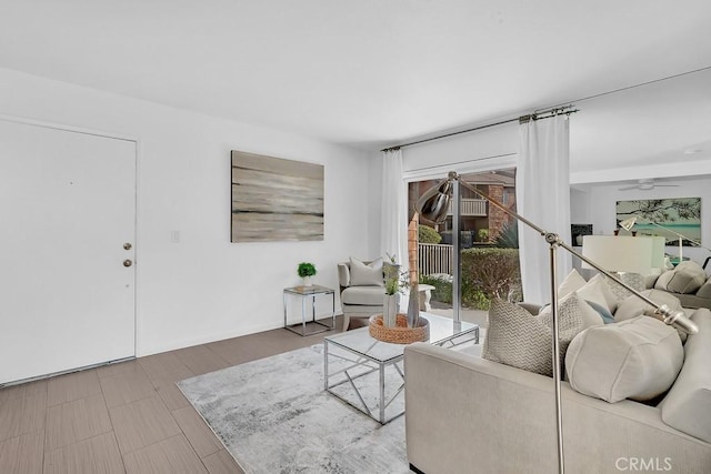 living room with ceiling fan