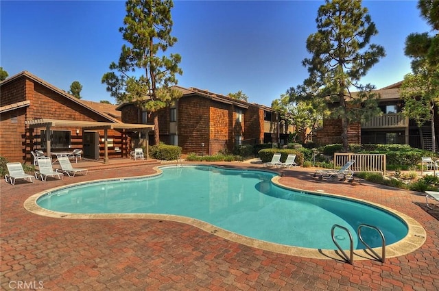 view of pool with a patio area