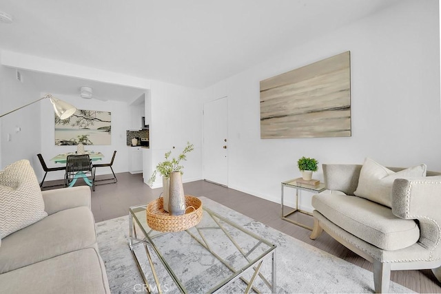 living room with dark wood-type flooring