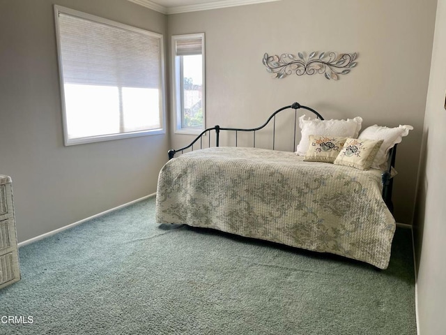 bedroom with carpet flooring and ornamental molding