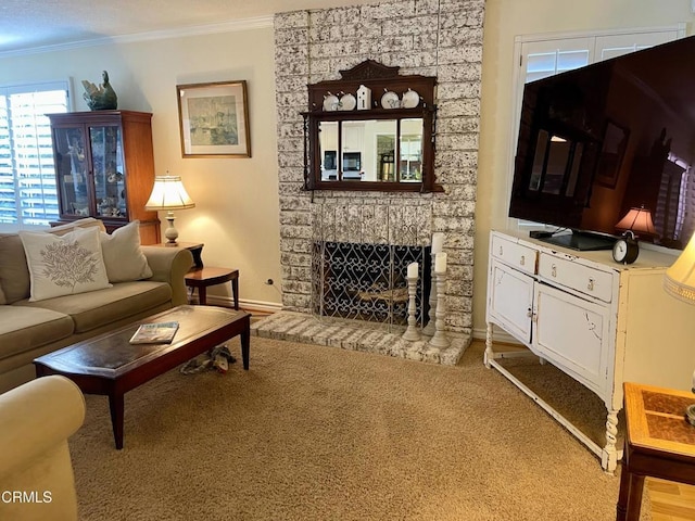 carpeted living room with crown molding and a stone fireplace