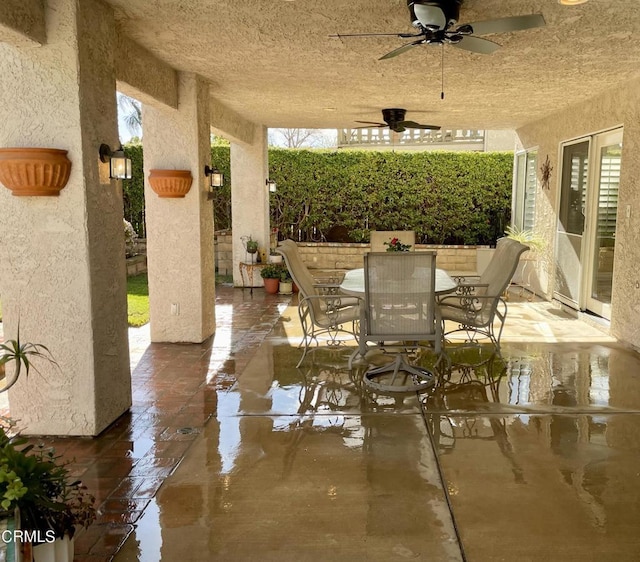 view of patio with ceiling fan