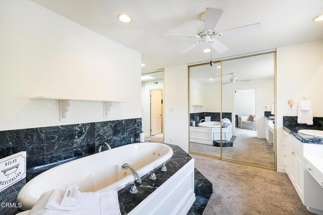 1590 Frazier St, Camarillo, CA 93012 - bathroom with ceiling fan, vanity, a garden tub, and recessed lighting