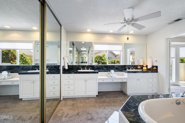 1590 Frazier St, Camarillo, CA 93012 - full bath with a textured ceiling, vanity, a bath, ceiling fan, and recessed lighting